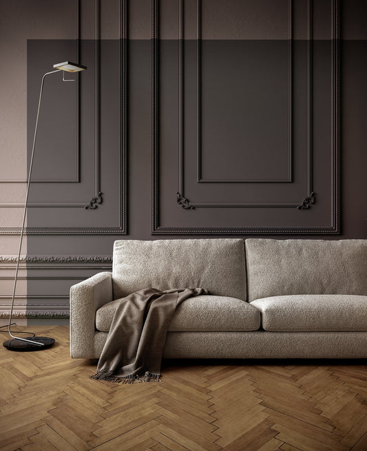 Family relaxing on the best designer couch in a bright, airy sitting room