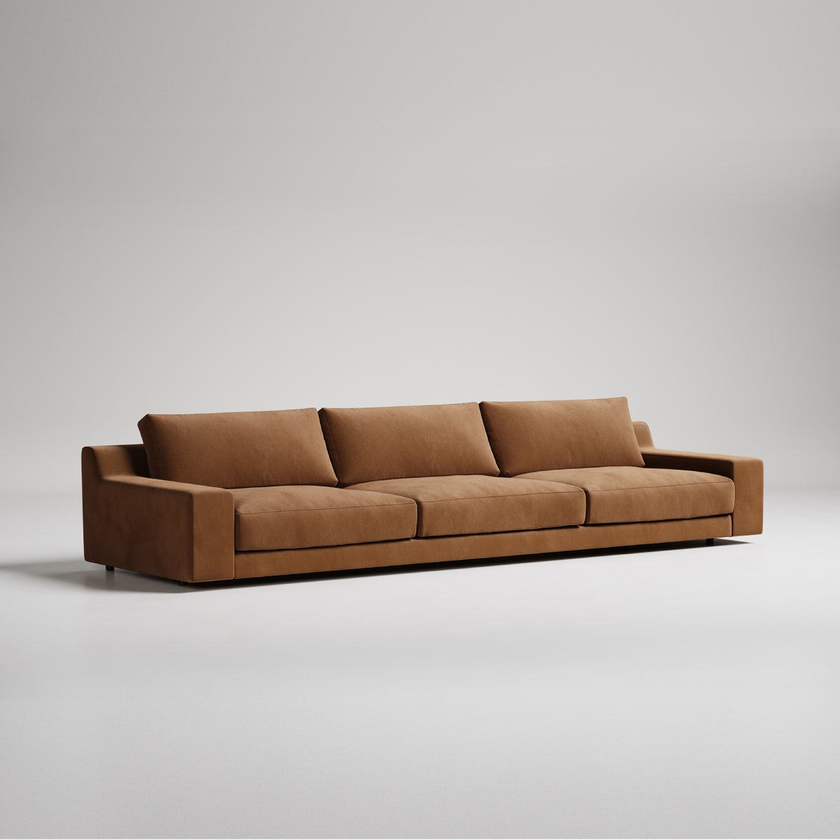 Modern brown velvet 3-seater sofa with clean lines against neutral gray background
