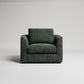 Modern dark green armchair with clean lines and textured fabric upholstery against light gray background
