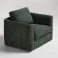 Modern forest green velvet armchair with clean lines and plush cushioning against light gray background
