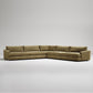 Modern L-shaped sectional sofa in olive green textured fabric against white background

