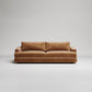 Modern tan velvet sofa with clean lines on white background, minimalist contemporary furniture design
