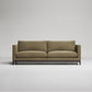 Modern olive green upholstered sofa with clean lines and dark wooden legs against neutral grey background
