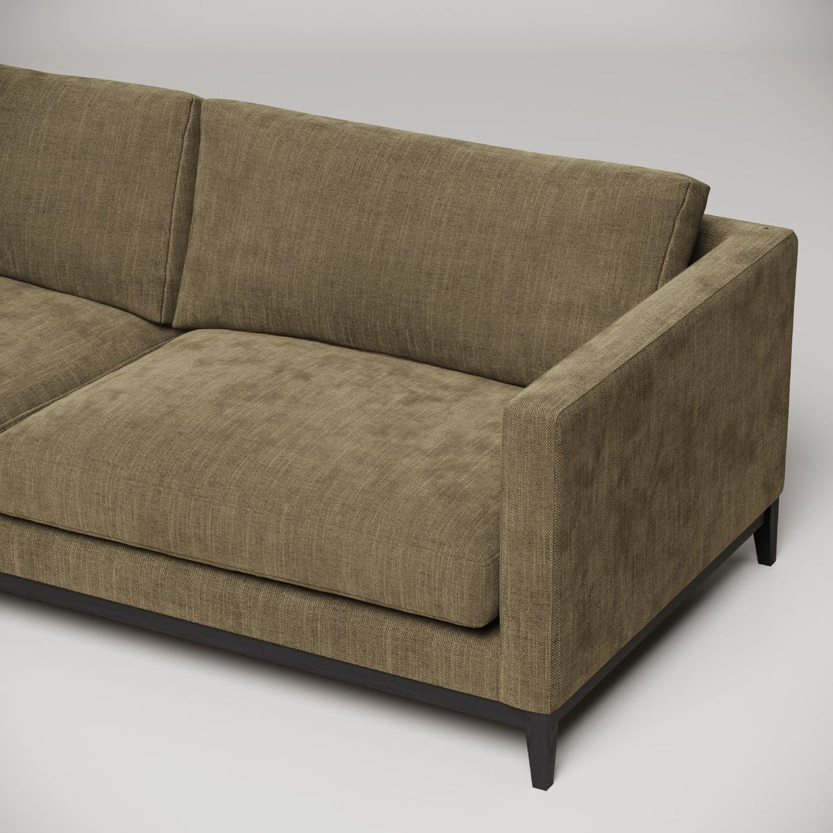 Modern olive green upholstered sofa with clean lines and black legs, shown in partial view against white background
