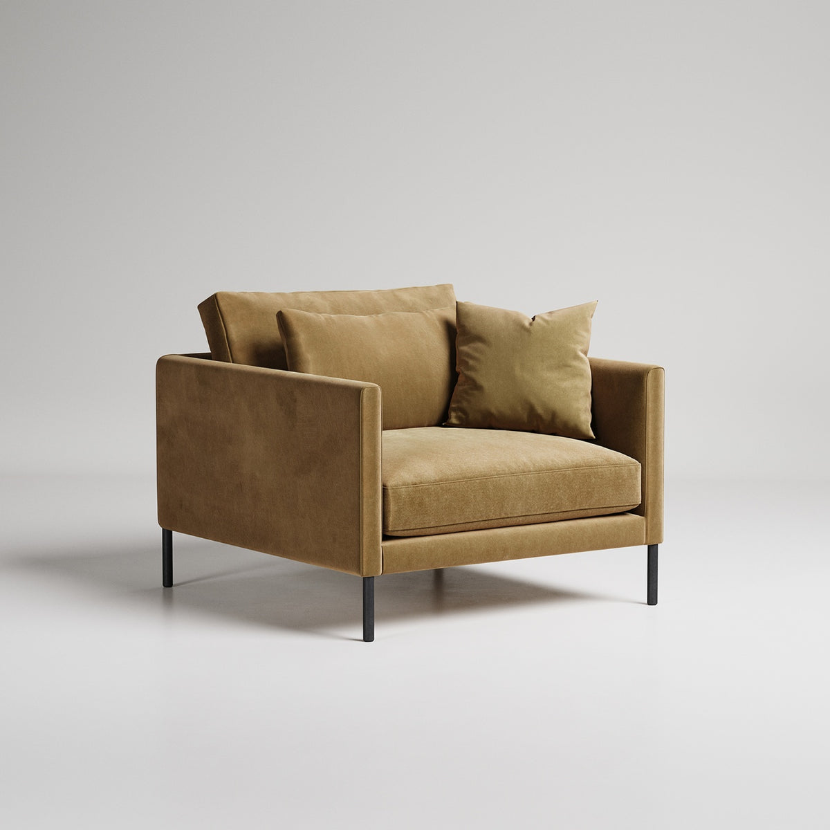Modern camel velvet armchair with black metal legs on light gray background, studio product photography
