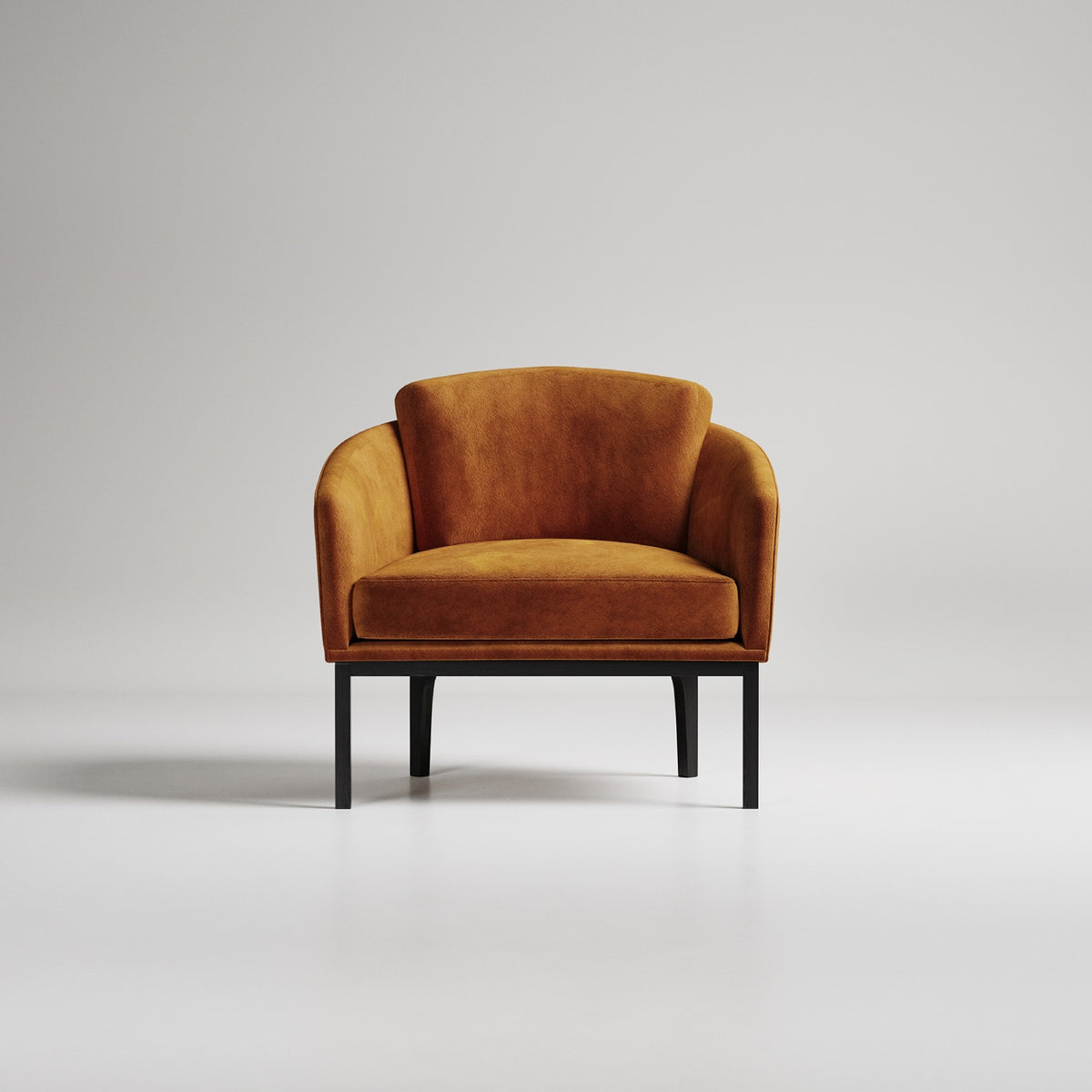 Modern rust-colored velvet armchair with black metal legs against white background, minimalist studio shot
