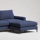 Modern navy blue sectional sofa with chaise lounge on black metal legs against white background
