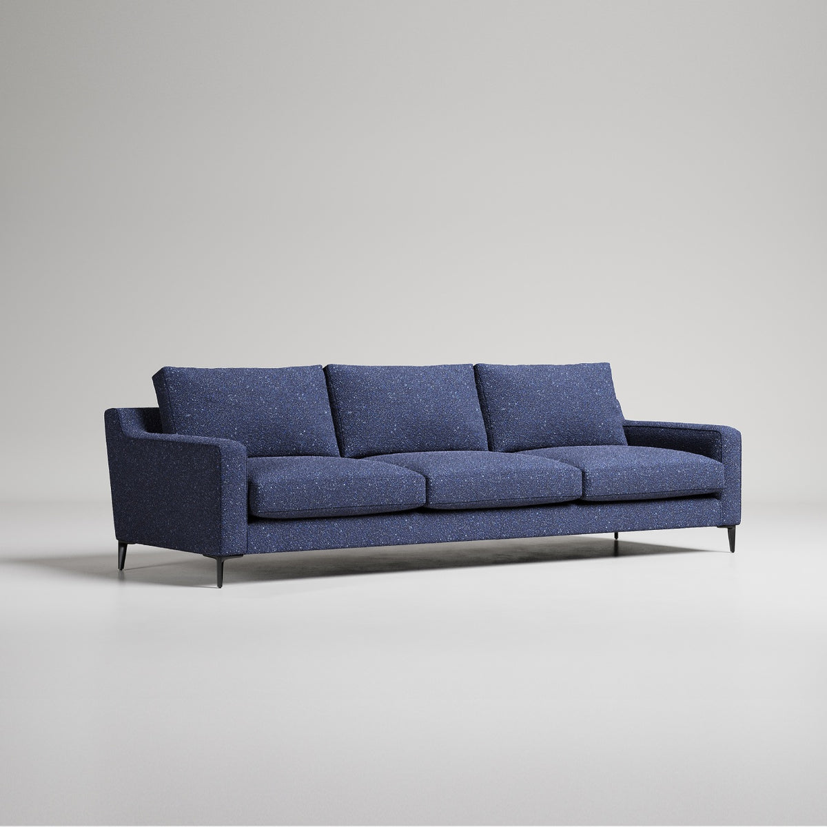 Modern navy blue 3-seater sofa with metal legs, textured fabric upholstery, against light gray background
