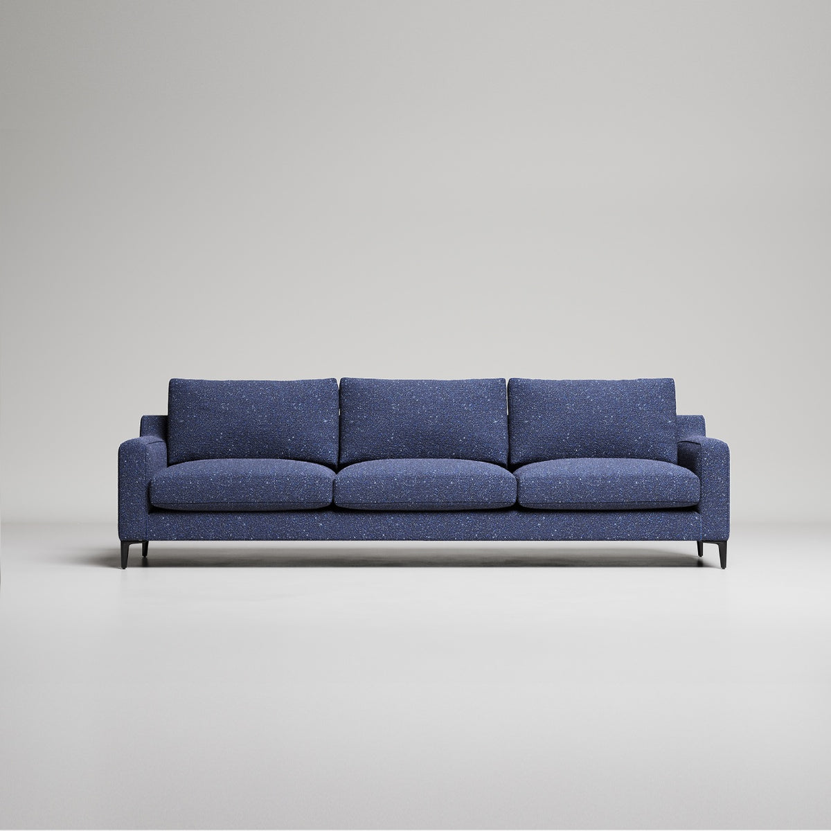 Modern navy blue 3-seater sofa with speckled fabric upholstery and slim metal legs against gray background

