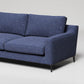 Modern navy blue sofa with speckled fabric texture and slim black metal legs against white background
