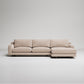 Beige sectional sofa on a light gray background