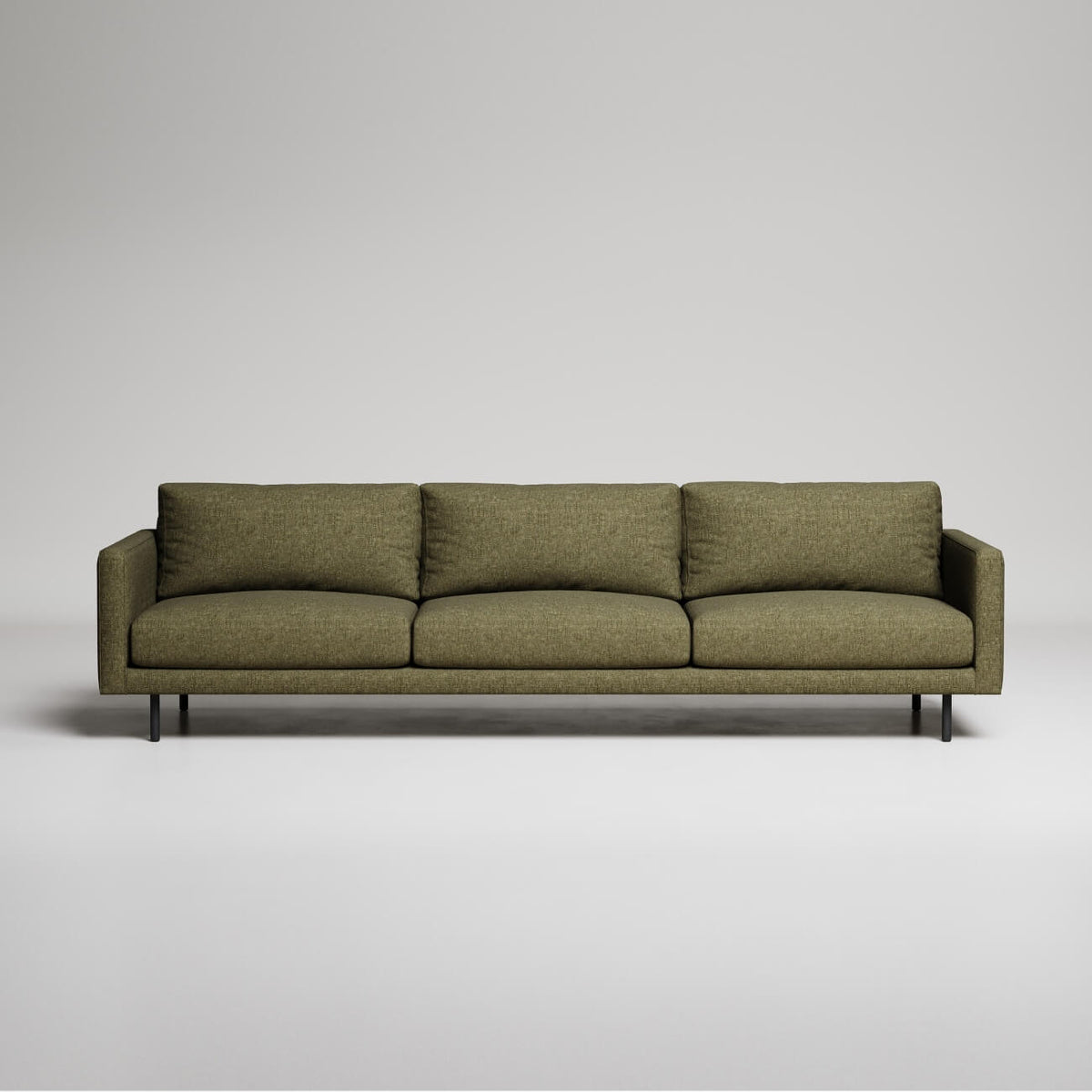Modern olive green 3-seater sofa with slim metal legs against neutral gray background
